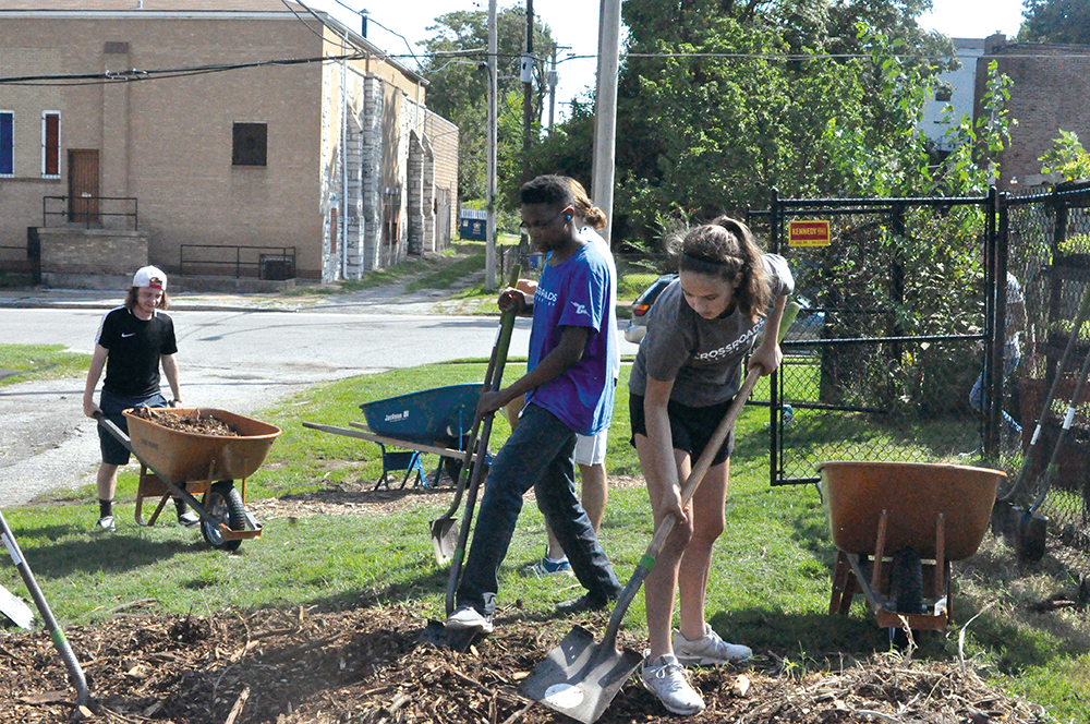 Crossroads students help create new gardens in the city on Good Work day