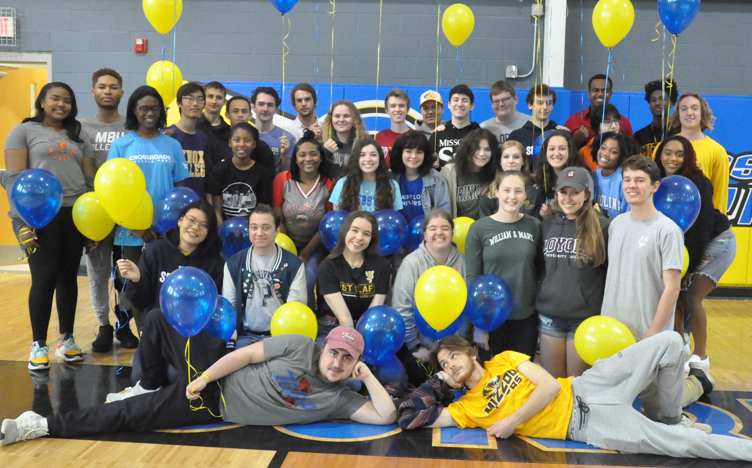 Balloon Day at Crossroads. Seniors wore shirts showing their colleges.