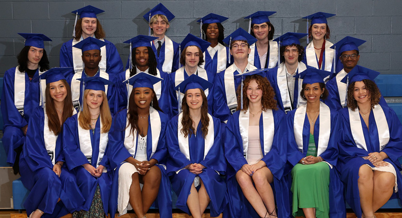 Crossroads class of 2023 in graduation gowns